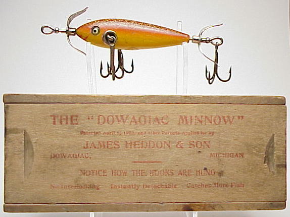 Heddon Dowagiac Centennial Edition 4 3/4 Wood Vamp fishing lure, box and  manual all in near mint condition - AAA Auction and Realty
